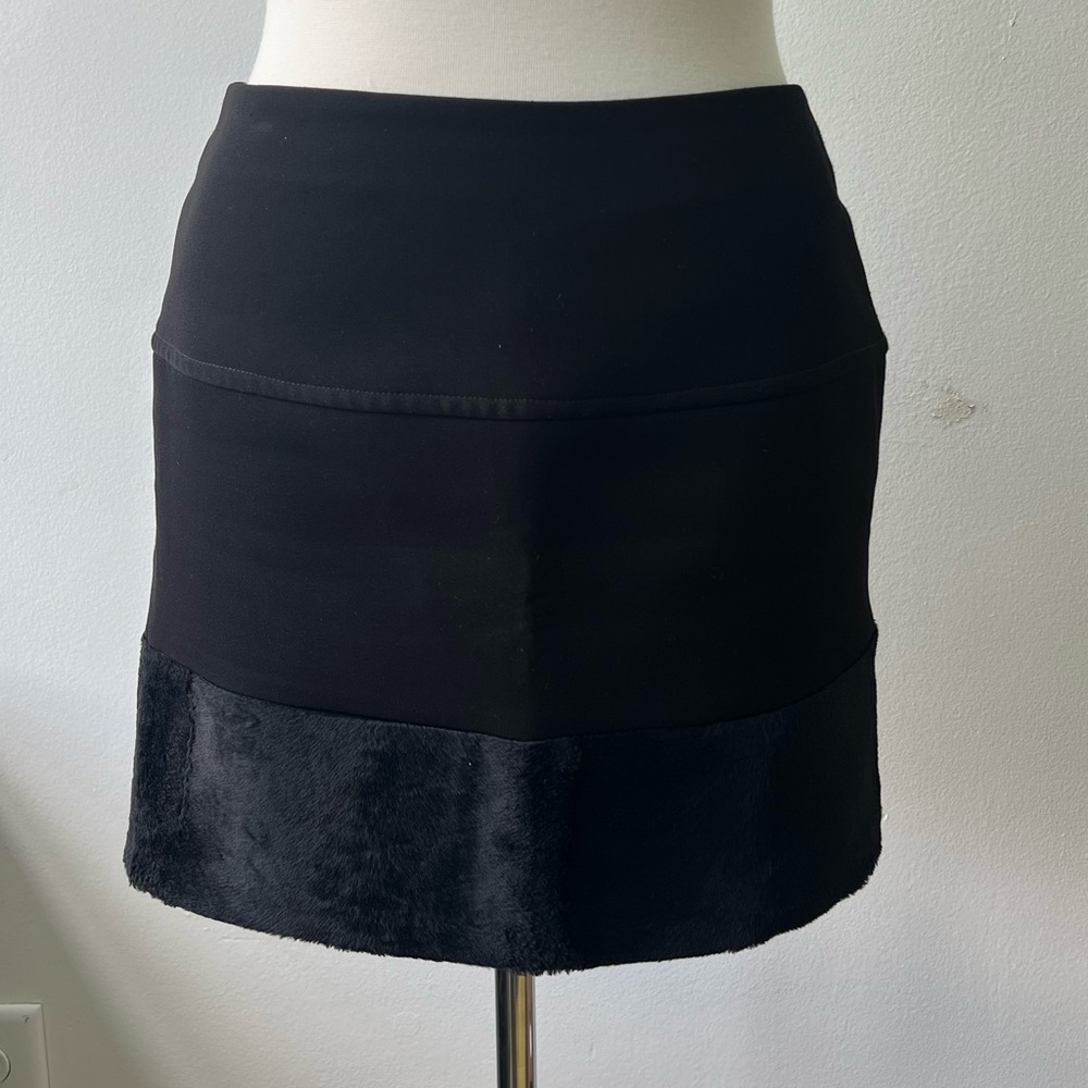 Maje Black Mini Skirt with Faux Fur Trim.